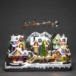 Konstsmide Juledekorasjon<By med flyvende rensdyr, nisse og musikk LED